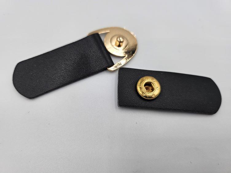 Dekorativer Verschluss in schwarz und gold - 0