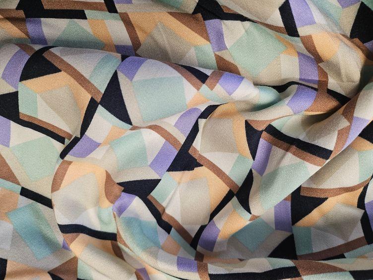 Viskose mit geometrischem Muster, türkis